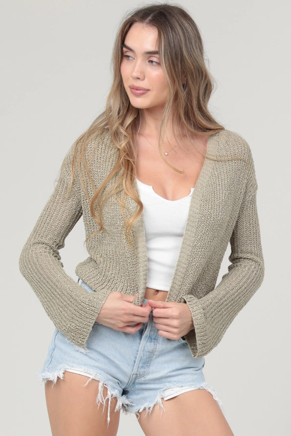 Woman wearing angie Light Weight Flare Sleeve Cardigan in beige knit over white tank and denim shorts