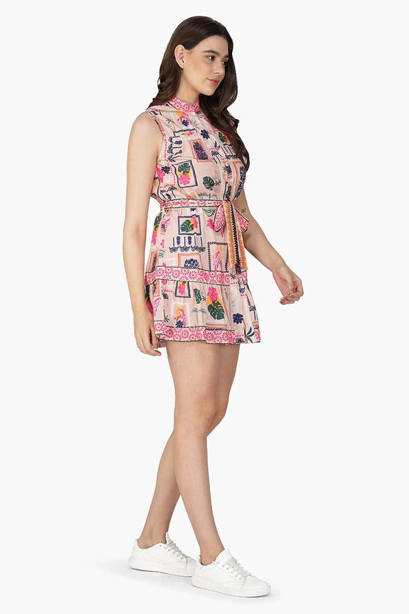 Woman wearing America & Beyond Print Mix Match Dress with floral and geometric patterns, paired with white sneakers