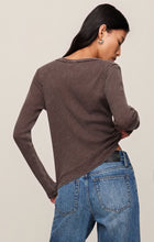 Woman wearing dark chocolate Arlet Mini Thermal Top by z supply, showing back detail and texture of long sleeves.