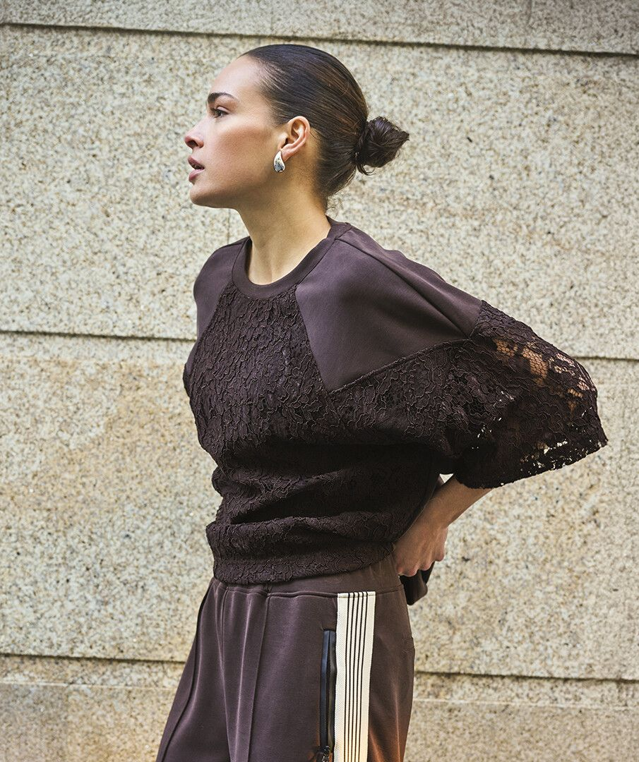 Cacao Modal Lace Top by esqualo in brown with lace sleeves modeled outdoors