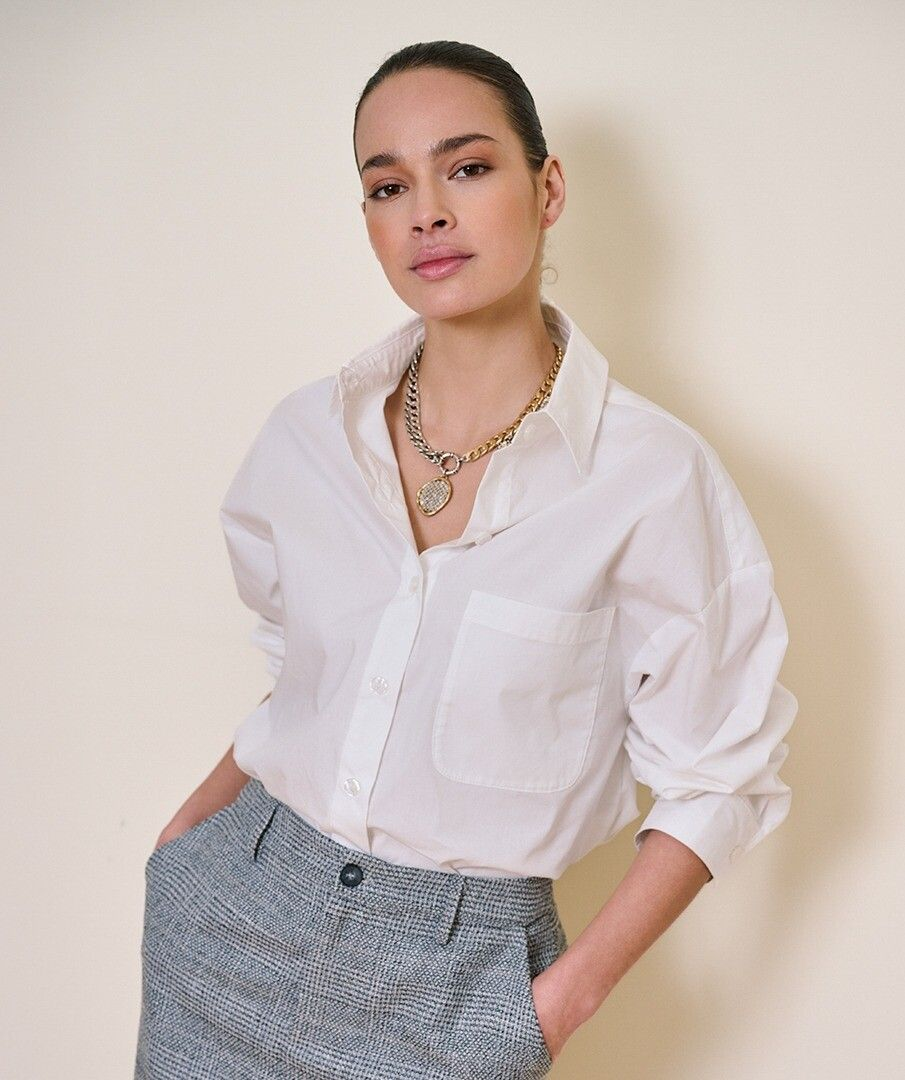 Off White Oversized Pocket Poplin Blouse by esqualo modeled with rolled sleeves and a chest pocket