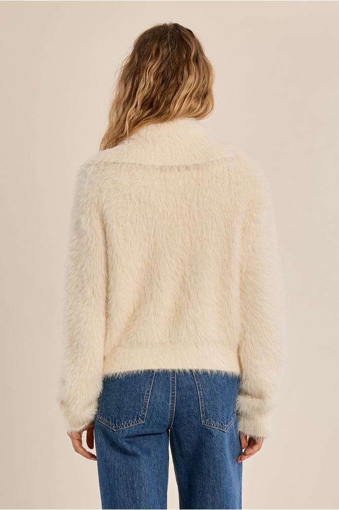 Molly Bracken Cream Collar Cardigan shown from the back with blue jeans