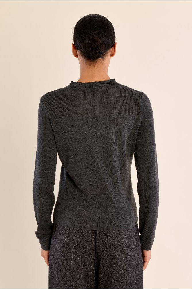 Molly Bracken Dark Grey Knit Top shown from the back on a model
