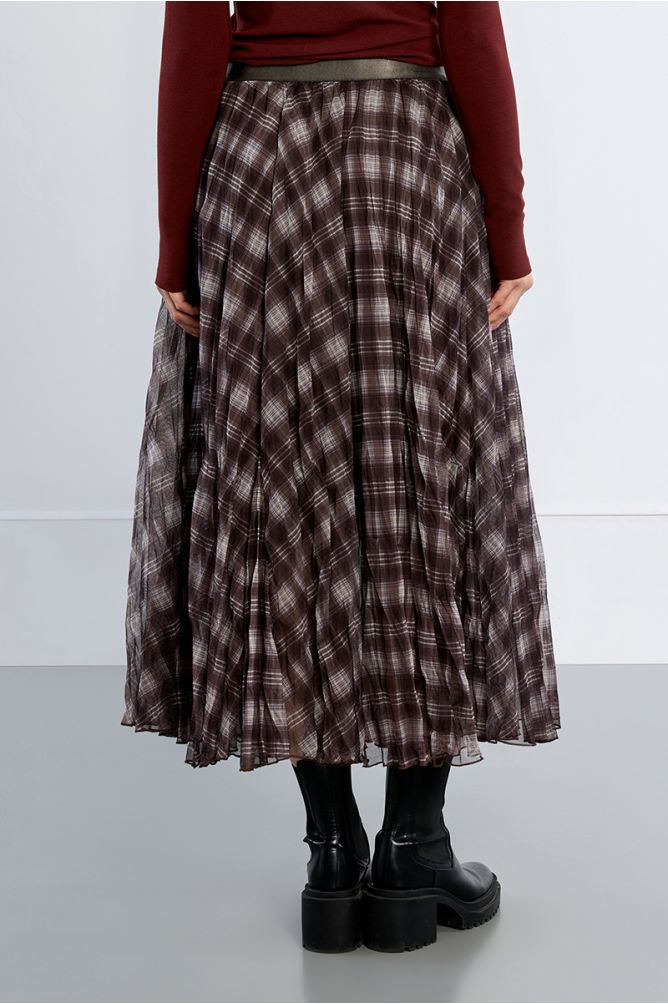 Chocolate Plaid Skirt by Molly Bracken shown on model in a long flowing plaid style with black platform boots