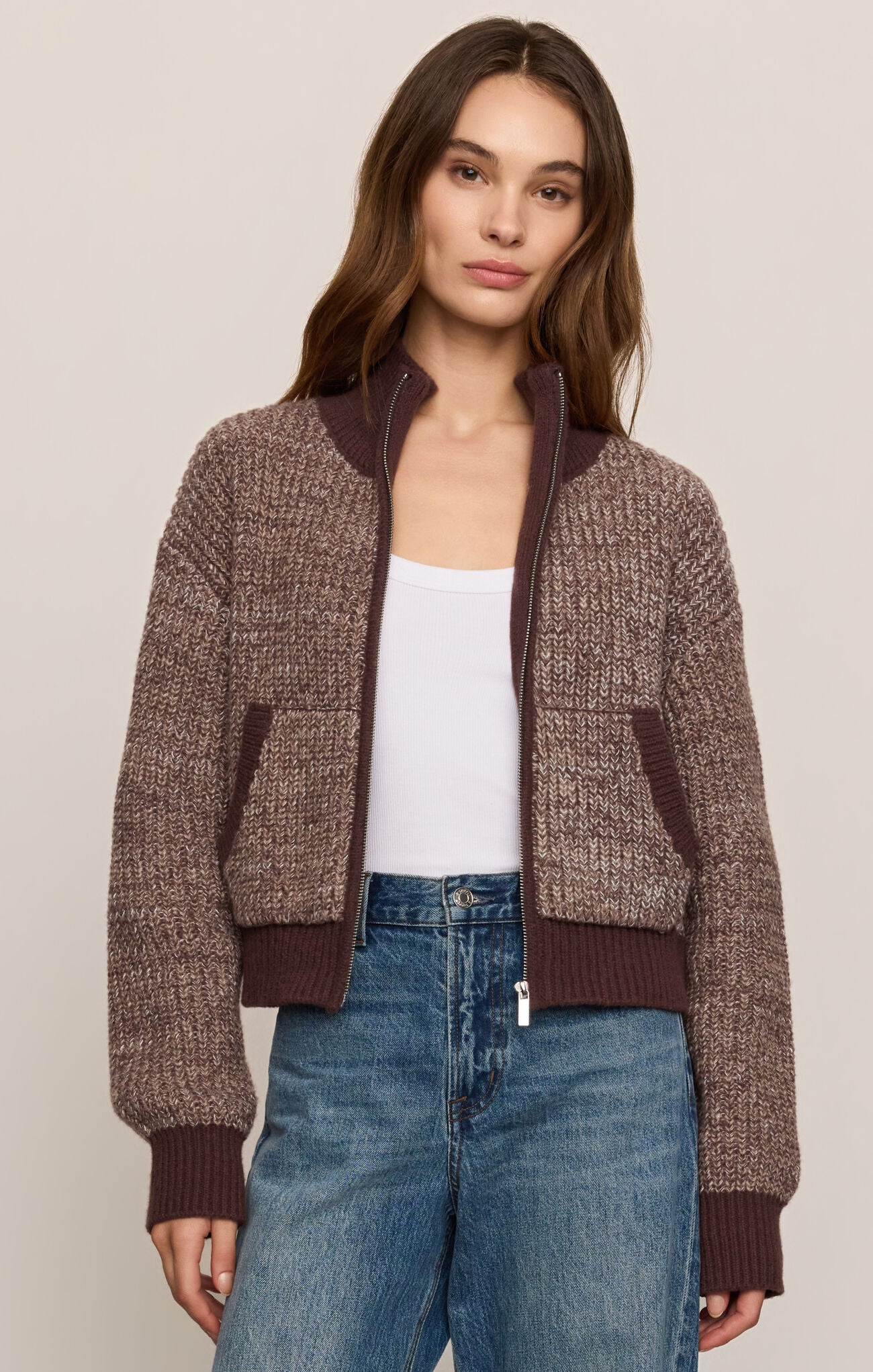 Z Supply brown marled zip-front cardigan worn open over a white tank and blue jeans