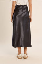 Gun Metal Skirt by Molly Bracken shown in a glossy dark midi style