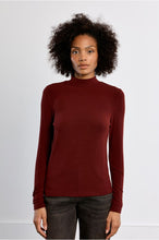 Molly Bracken Whisper Top in burgundy with a fitted high neck and long sleeves