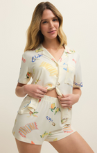 Woman wearing Vanilla Ice Tropic PJ Short by z supply with a soft tropical print and relaxed fit in lightweight fabric