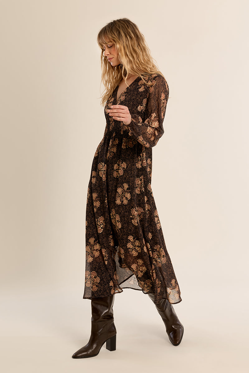 Molly Bracken Chocolate Print Dress in black floral print with long sleeves and boots