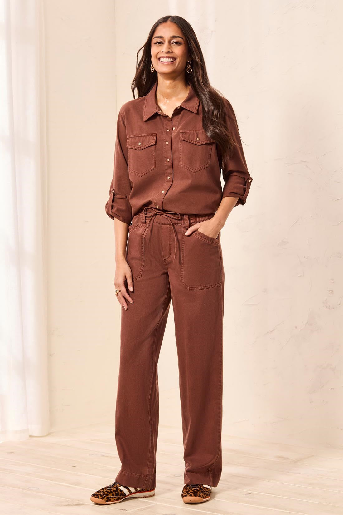 Tribal Rustic Brown Audrey Pull On Flowy Wide Leg Pants with Drawstring worn by smiling model
