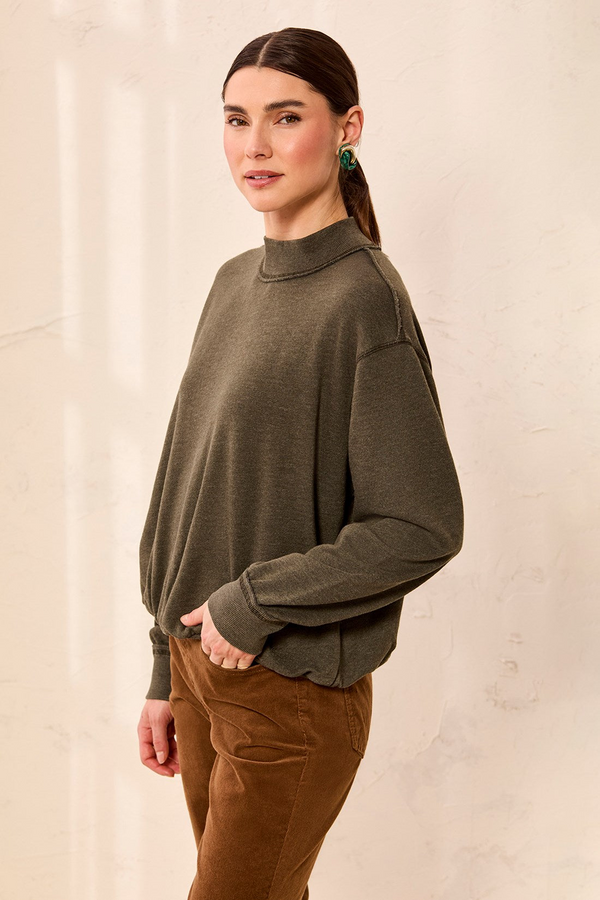 Tribal Cedar Green Garment Dye Bubble Sweatshirt worn by a model