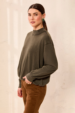 Tribal Cedar Green Garment Dye Bubble Sweatshirt worn by a model