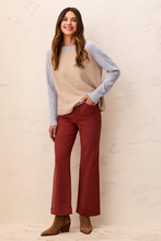 Tribal Wide Leg Pants styled with a beige sweater and brown ankle boots on a smiling woman