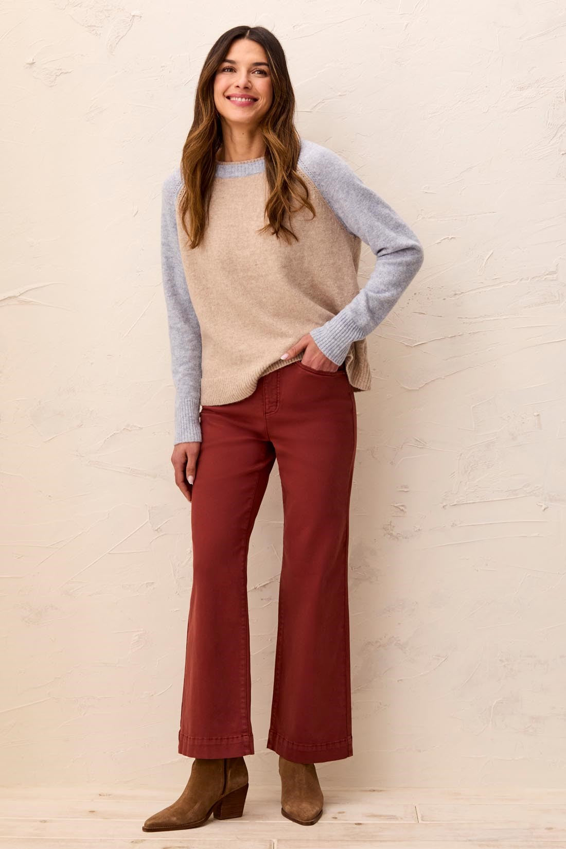 Tribal Wide Leg Pants styled with a beige sweater and brown ankle boots on a smiling woman
