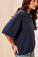 Tribal Nightfall Knit Top in navy with short sleeves and ribbed hem worn with a statement necklace