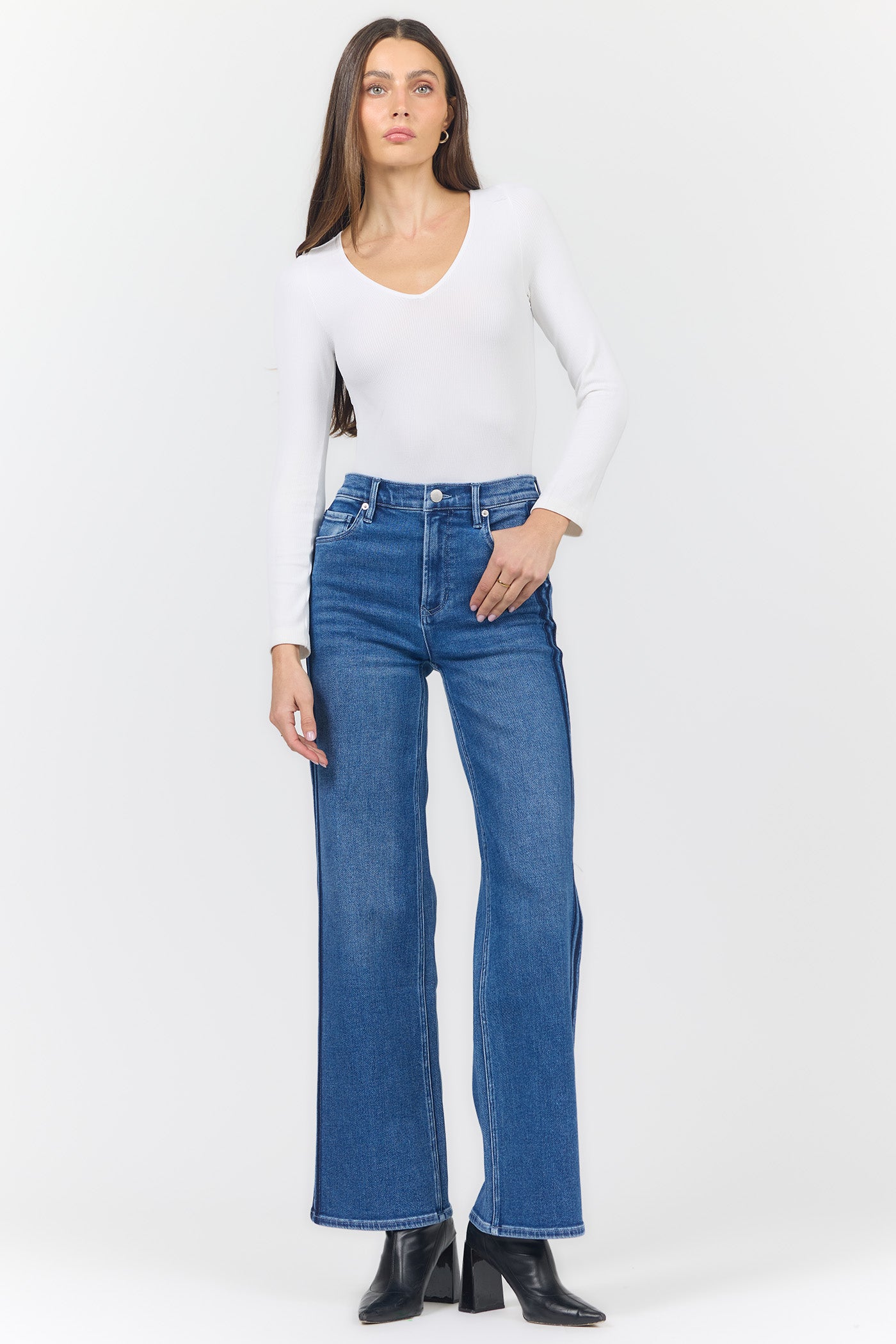 Simulated alt text for Margot Drifting Jeans for bella-jules-fashion-boutique.myshopify.com. You are an expert SEO agent. You will generate an ALT text for this image. <Product_Context> Only use the following explicitly enabled Shopify catalog context: ...