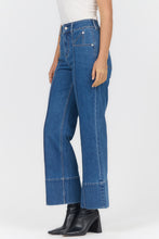 Simulated alt text for Holly Belby Jeans for bella-jules-fashion-boutique.myshopify.com. You are an expert SEO agent. You will generate an ALT text for this image. <Product_Context> Only use the following explicitly enabled Shopify catalog context: ...
