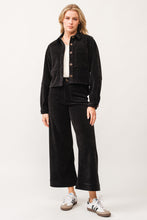Simulated alt text for Black Cropped Gina Card Jacket for bella-jules-fashion-boutique.myshopify.com. You are an expert SEO agent. You will generate an ALT text for this image. <Product_Context> Only use the following explicitly enabled Shopify catalog context: ...