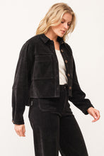 Simulated alt text for Black Cropped Gina Card Jacket for bella-jules-fashion-boutique.myshopify.com. You are an expert SEO agent. You will generate an ALT text for this image. <Product_Context> Only use the following explicitly enabled Shopify catalog context: ...