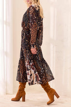 Tribal Mixed Print Drama Dress by Tribal featuring a long mixed print silhouette and brown knee high boots
