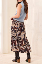 Tribal Printed Skirt by Tribal with an abstract multicolor pattern styled with a blue sleeveless top and boots