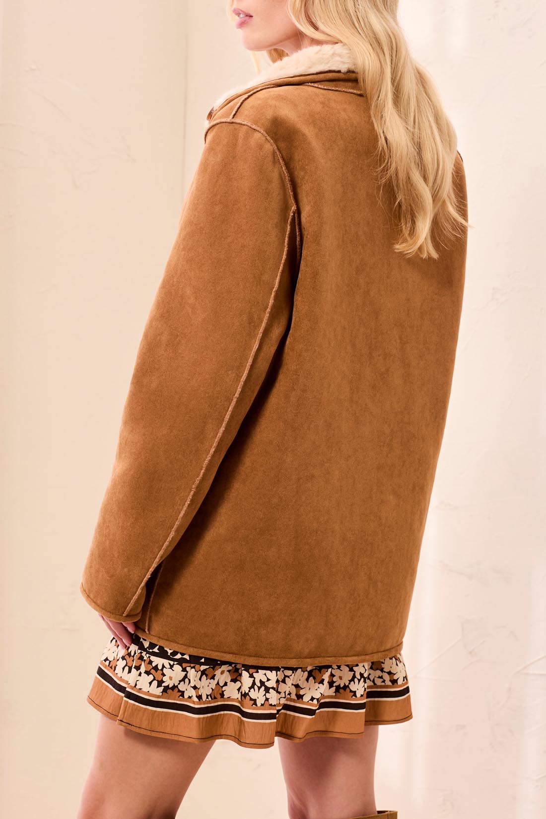 Tribal Walnut Reversible Coat shown from the back in walnut brown suede texture
