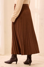 Tribal Pleated Skirt in rich brown with flowing pleats styled with a cream sweater and heeled boots