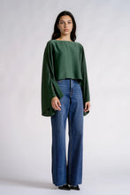 Elan Camille green draped top with split sleeves, styled with jeans
