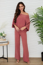Milio Milano rose crew-neck batwing knit top, styled with matching pants