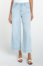 Front view of light blue Marine Flowers Stride Crop Wide Led w/ Embroidered Side Seam jeans by liverpool worn with white sandals