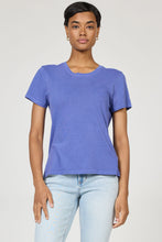 Woman wearing a dear john Pigment Skipper Blue Unity Tee with relaxed fit and casual style in light washed jeans