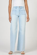 Front view of Misty Cloud Micah Jeans by dear john featuring a soft light wash and wide leg fit on model.