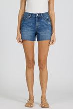 Rhodey Ivy Shorts by dear john in blue denim with a casual fit and subtle distressed detailing on a model wearing sandals
