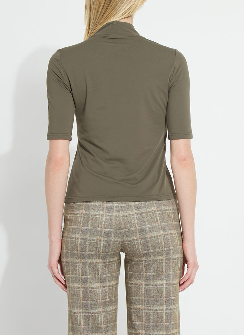 Mosswood Clara Mockneck Elbow Sleeve Top by Lysse shown from the back in olive with plaid trousers