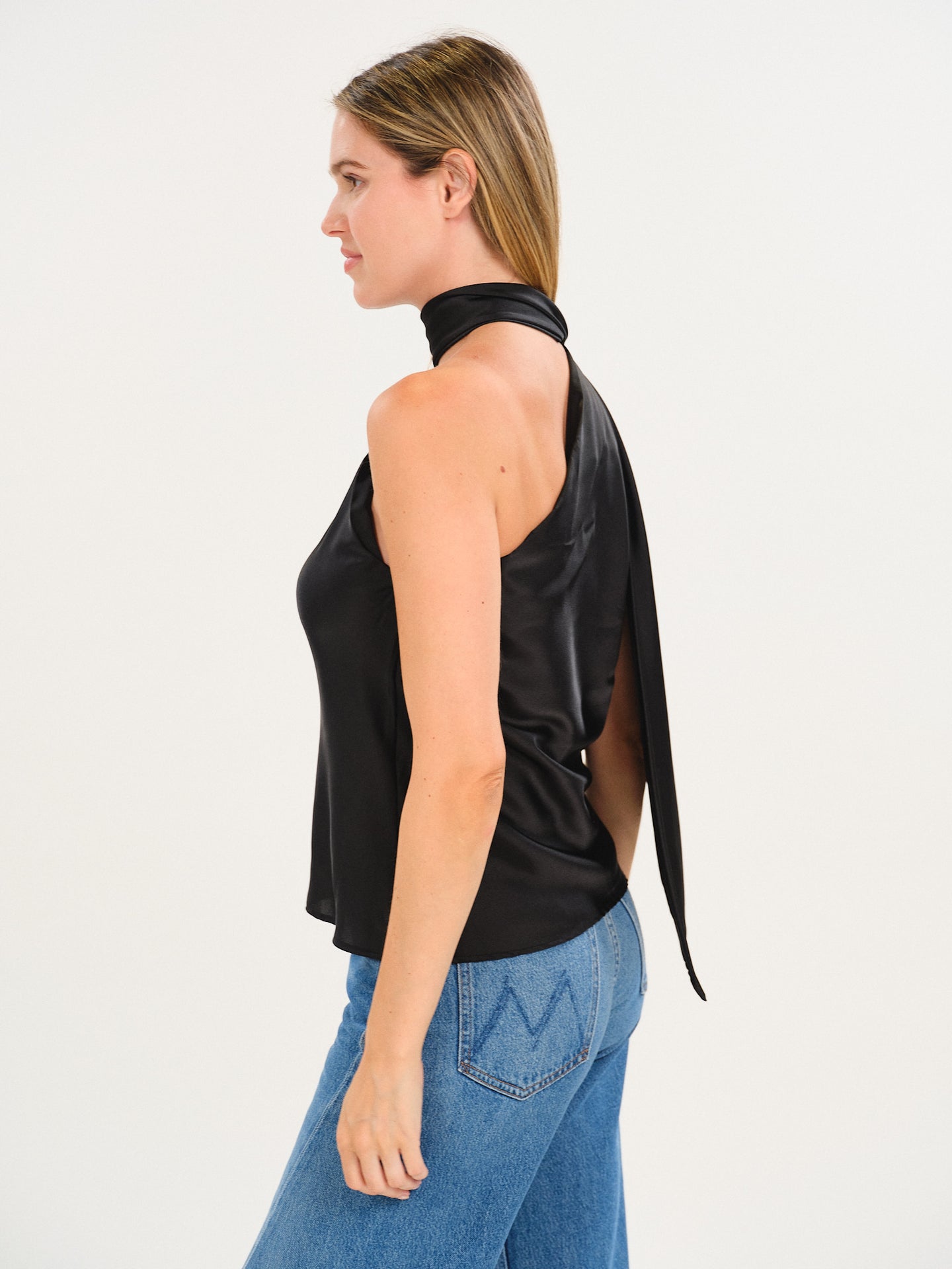Black Diana Scarf Tank by six/fifty modeled with a halter neckline and draped back detail