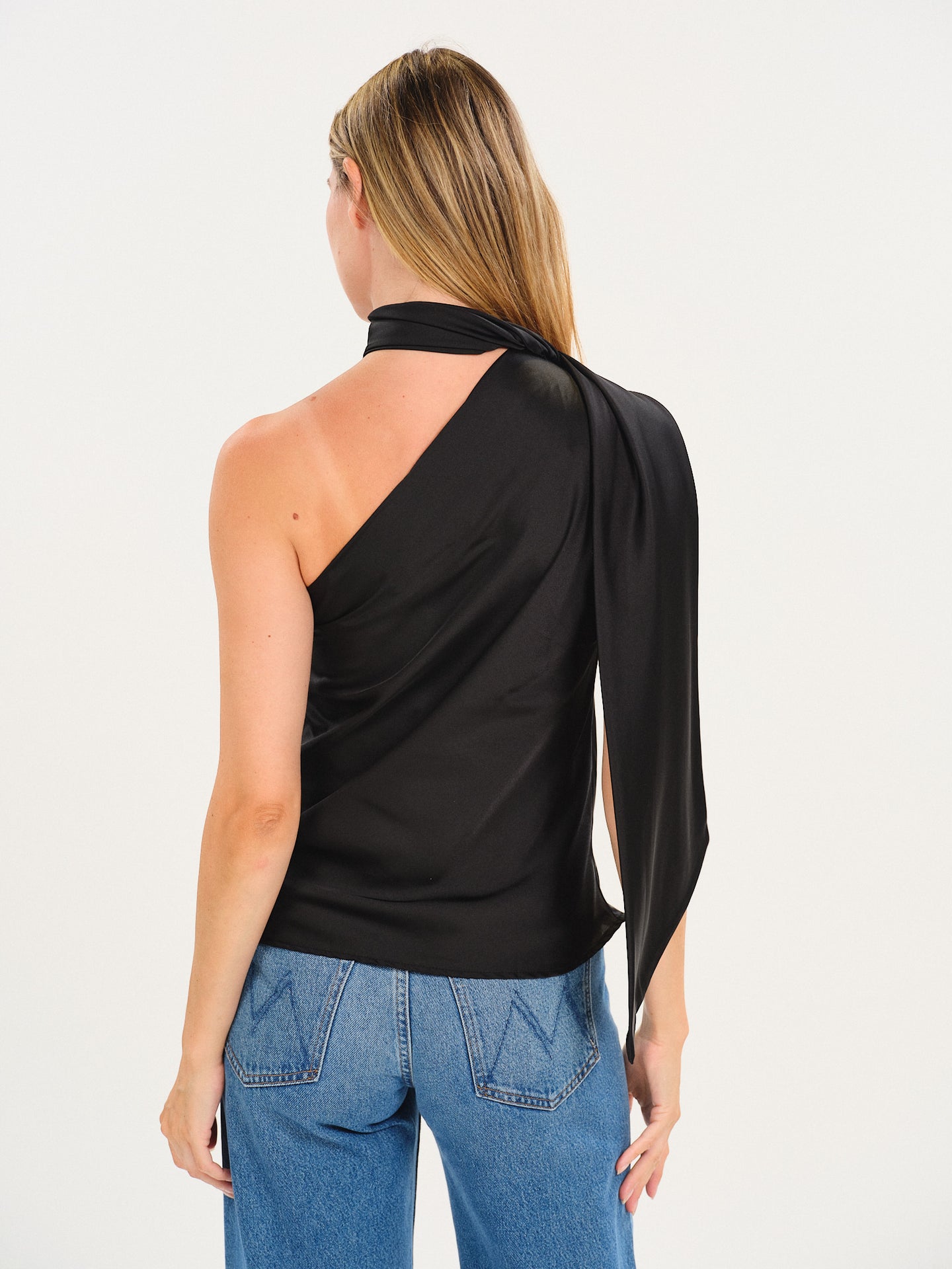 Black Diana Scarf Tank by six/fifty shown from the back with a draped one shoulder design
