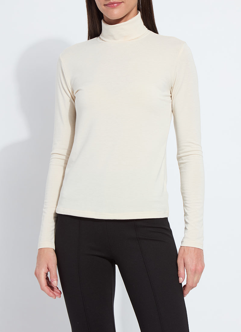 Lysse Essential Longsleeve Turtleneck in ivory styled with black pants