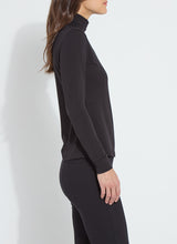 Lysse Essential Longsleeve Turtleneck in black modeled in profile