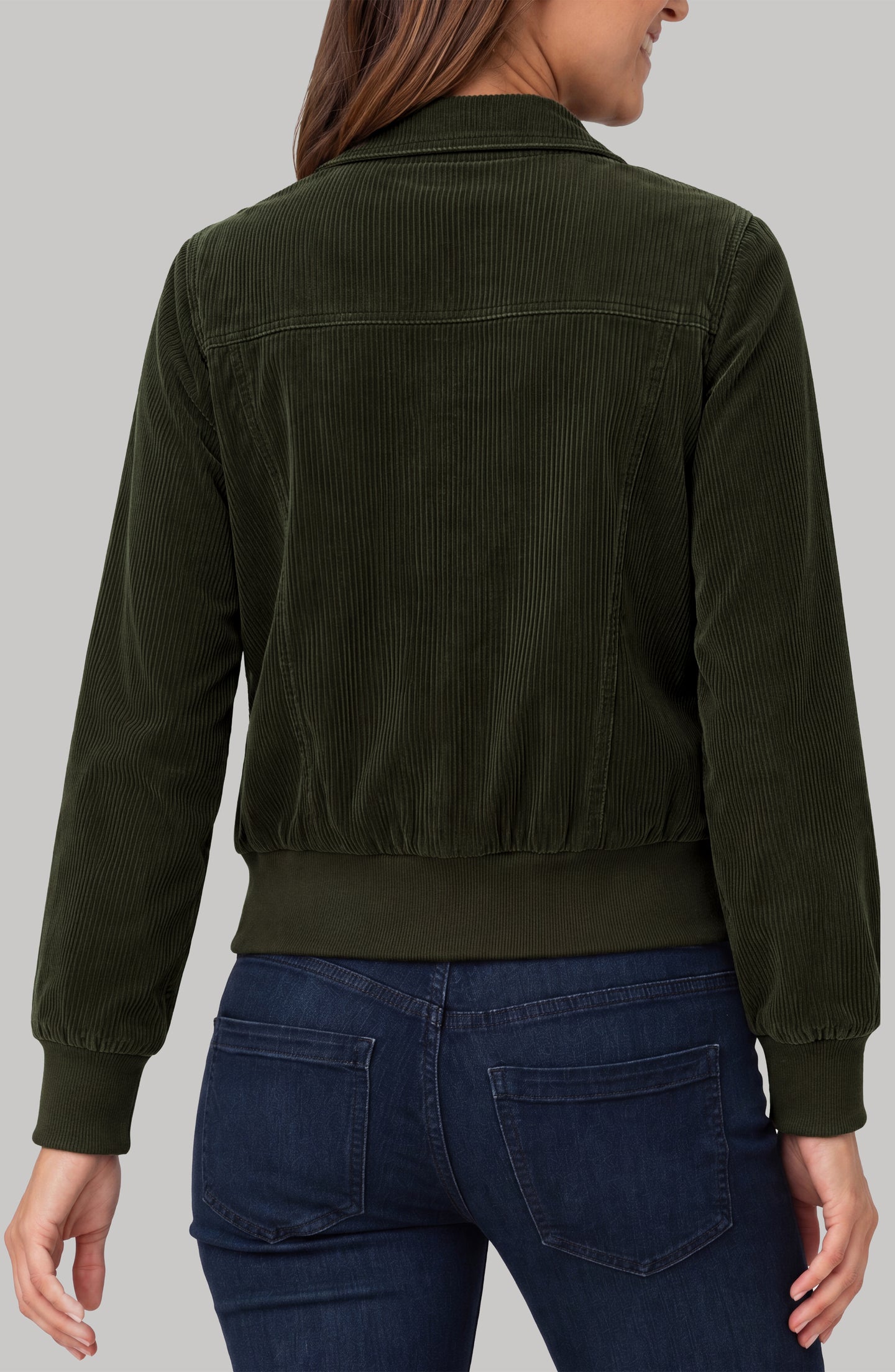 Back view of a woman wearing a Hunter Green Zip Front Collared Bomber Jacket by liverpool with dark denim jeans