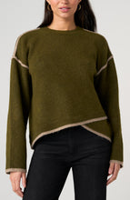 Woman wearing Olive with Mushroom Crewneck Sweater with Cream Tulip Hem by liverpool, paired with black jeans