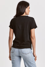 Woman wearing black Vanya V Neck Tee by dear john shown from the back with light blue jeans against white background