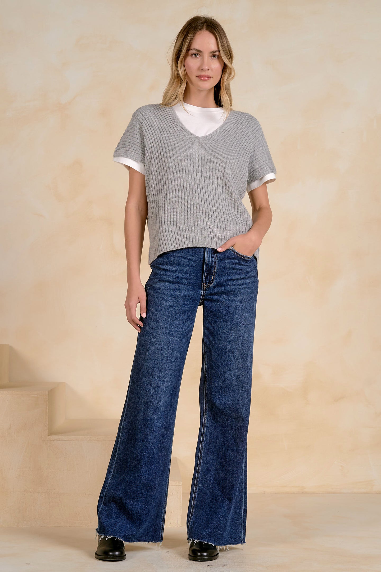 Elan Ashton grey short-sleeve layered top with white collar and trim, styled with jeans