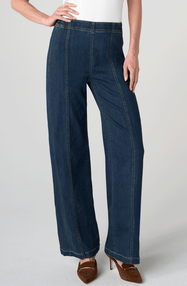Woman wearing Crosswind High Rise Pull-On Wide Leg with Seam Detail 32" Ins by liverpool in dark denim
