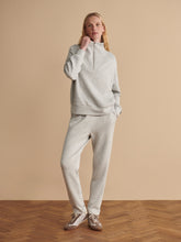 Varley Light Grey Marl The Rolled Cuff Pant 25 worn by a model in a relaxed outfit