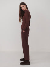 Varley Deep Mahogany Edna Long Sleeve Fitted Tee modeled with coordinating trousers