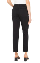 Back view of a woman wearing Black Rinse Liv Relaxed Skinny 28ins jeans by liverpool with black heeled sandals