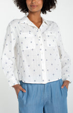 Off White Long Sleeve Button Front Shirt With High Low Hem featuring subtle pattern and front pockets by liverpool