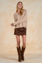 Elan Simply Stone beige V-neck sweater, styled with a brown skirt and boots