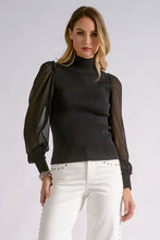 Elan Onyx black high-neck top with sheer sleeves, front view