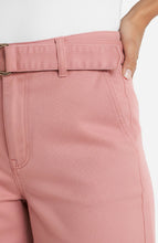 Close-up of a hand resting on dusty pink Misty Blush Stride Wide Leg w/ Self Belt 28 Inseam pants by liverpool